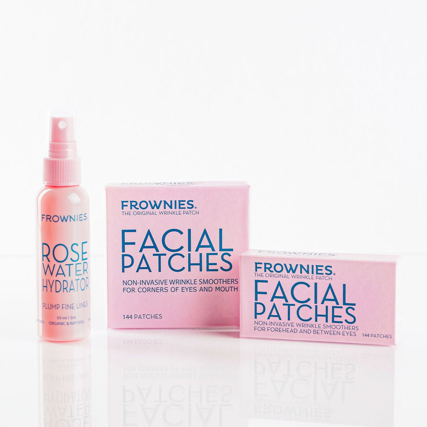 Skincare set featuring Frownies Rose Water Hydrator and Facial Patches against a white background.
