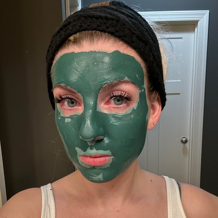 woman wearing blue green algae face mask for minimizing pores