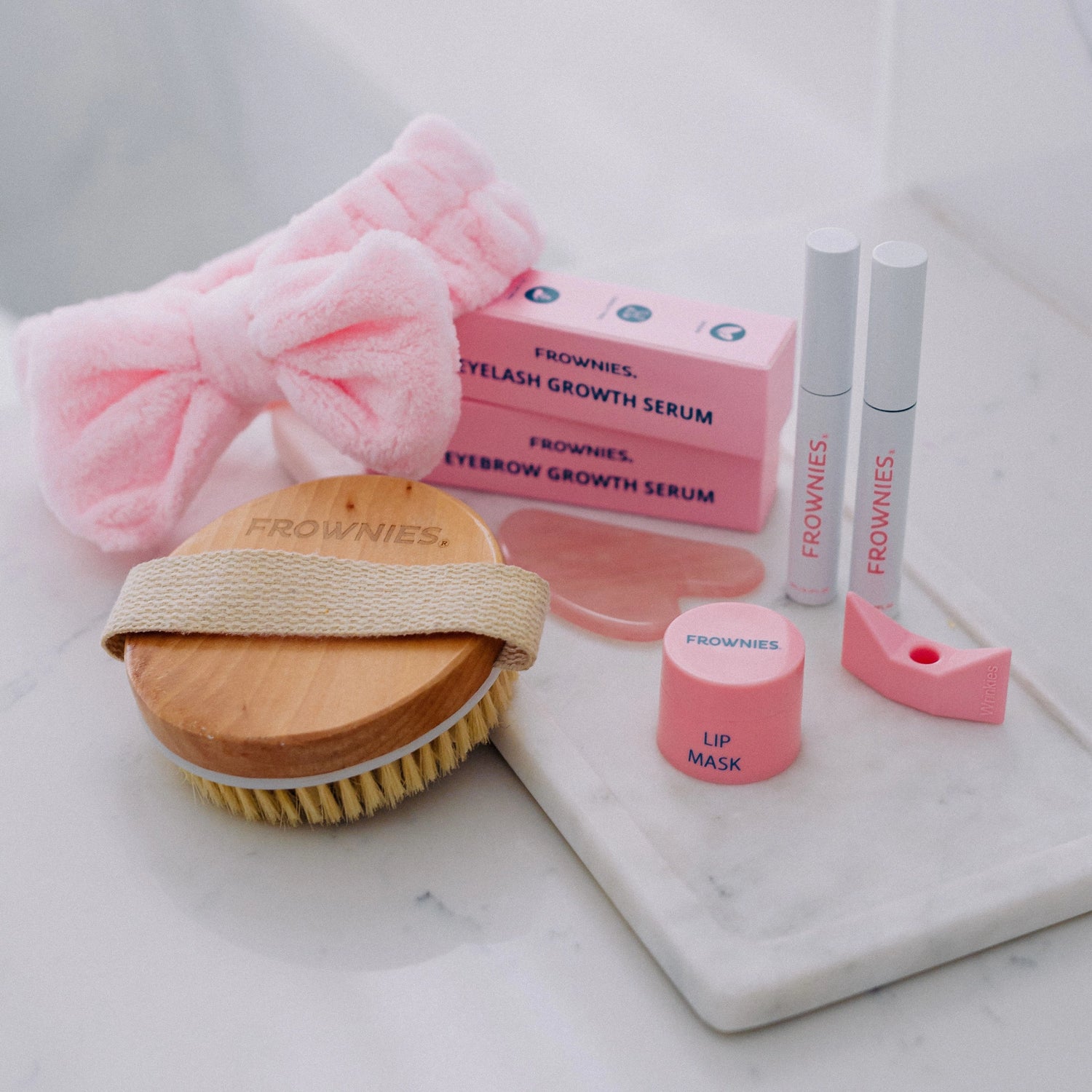 A group of Frownies products shown pictured together in an aesthetically pleasing layout