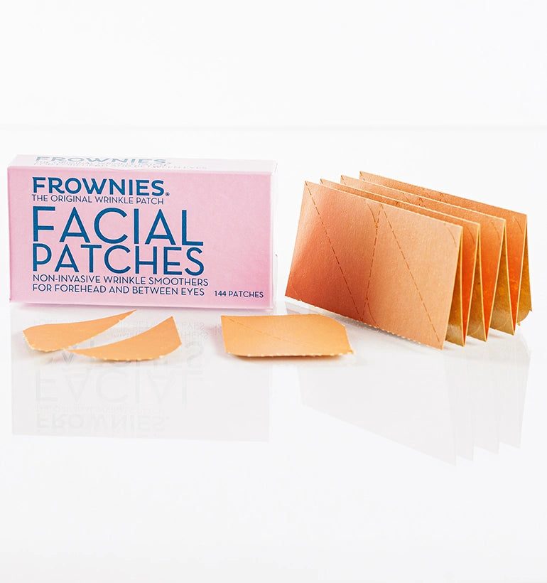 pink box with brown paper frownies facial patches