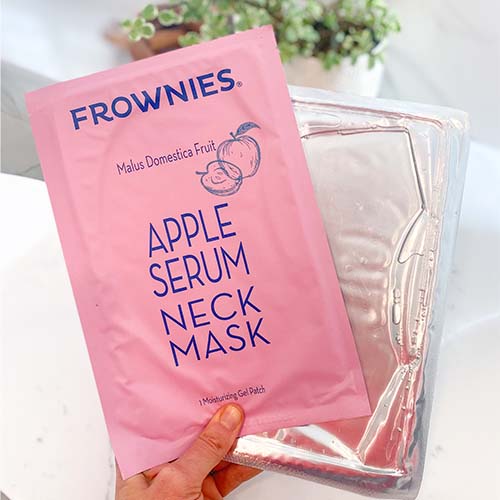 pink package of Neck Mask with Apple Stem Cell Serum Facial Patches, The Frownies   