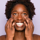 woman of color applying Cactus Collagen Under Eye Gels Facial Patches Frownies to brighten dark circles 