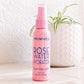 pink bottle of Rose Water Hydrator Spray (2 oz) Facial Patches Frownies  on white countertop
