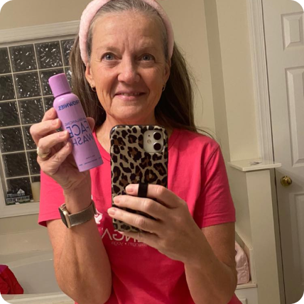 selfie of woman with mature skin holding ph balancing face wash My_new_go_to_face_wash