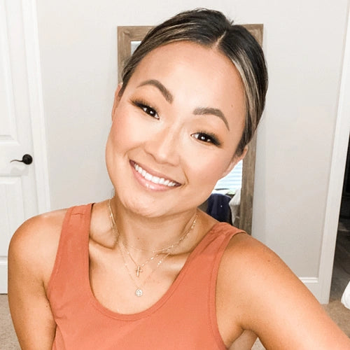 headshot of woman with beautiful skin
