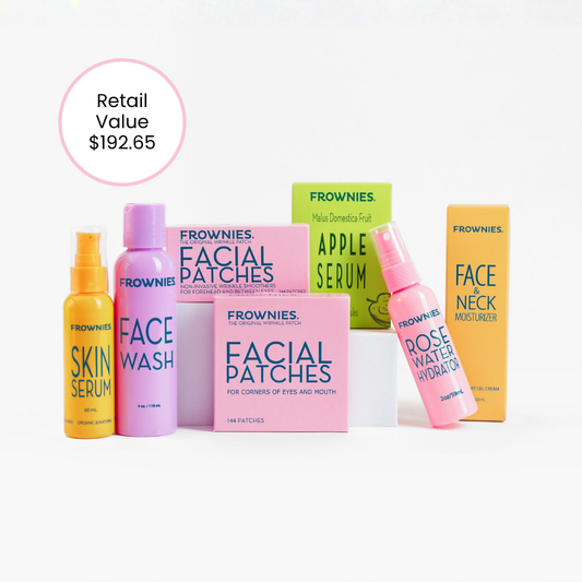 Frownies skincare product set including bottles and boxes on a white background