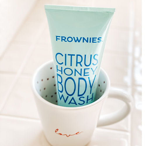 Body Wash/Citrus Honey 8 oz Skincare Products Frownies in a white coffee mug