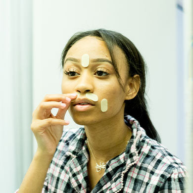 woman of color applying frownies gentle lifts to upper lip and 11 lines Trial Patches Trial/Travel Size Frownies   